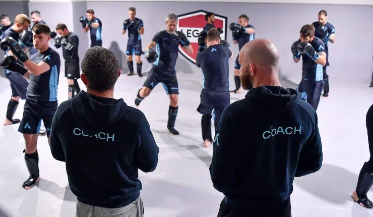 alta coaches training competitors mma in gym