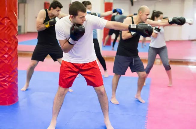 group training martial arts in gym 